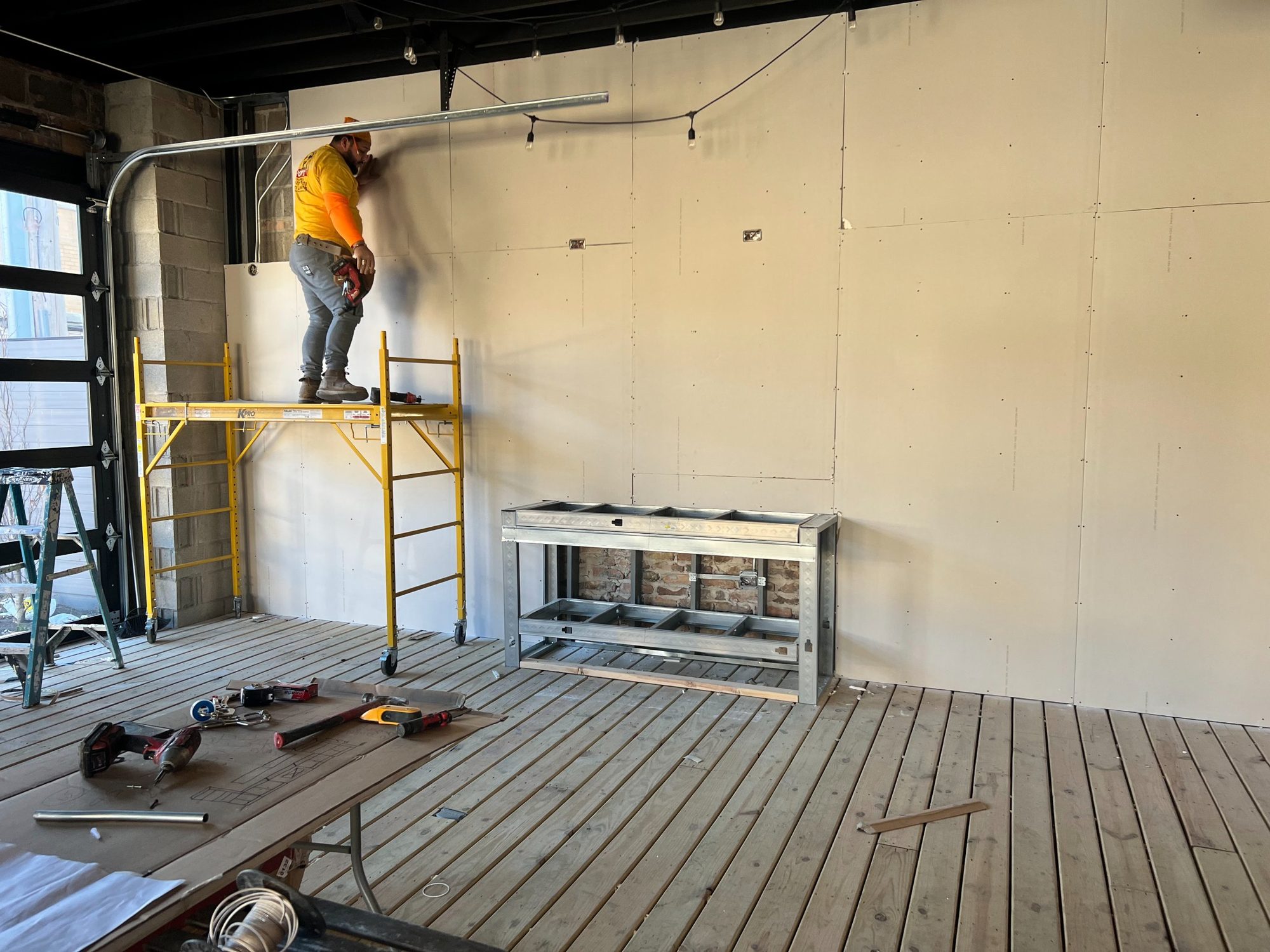 Drywall installation in progress