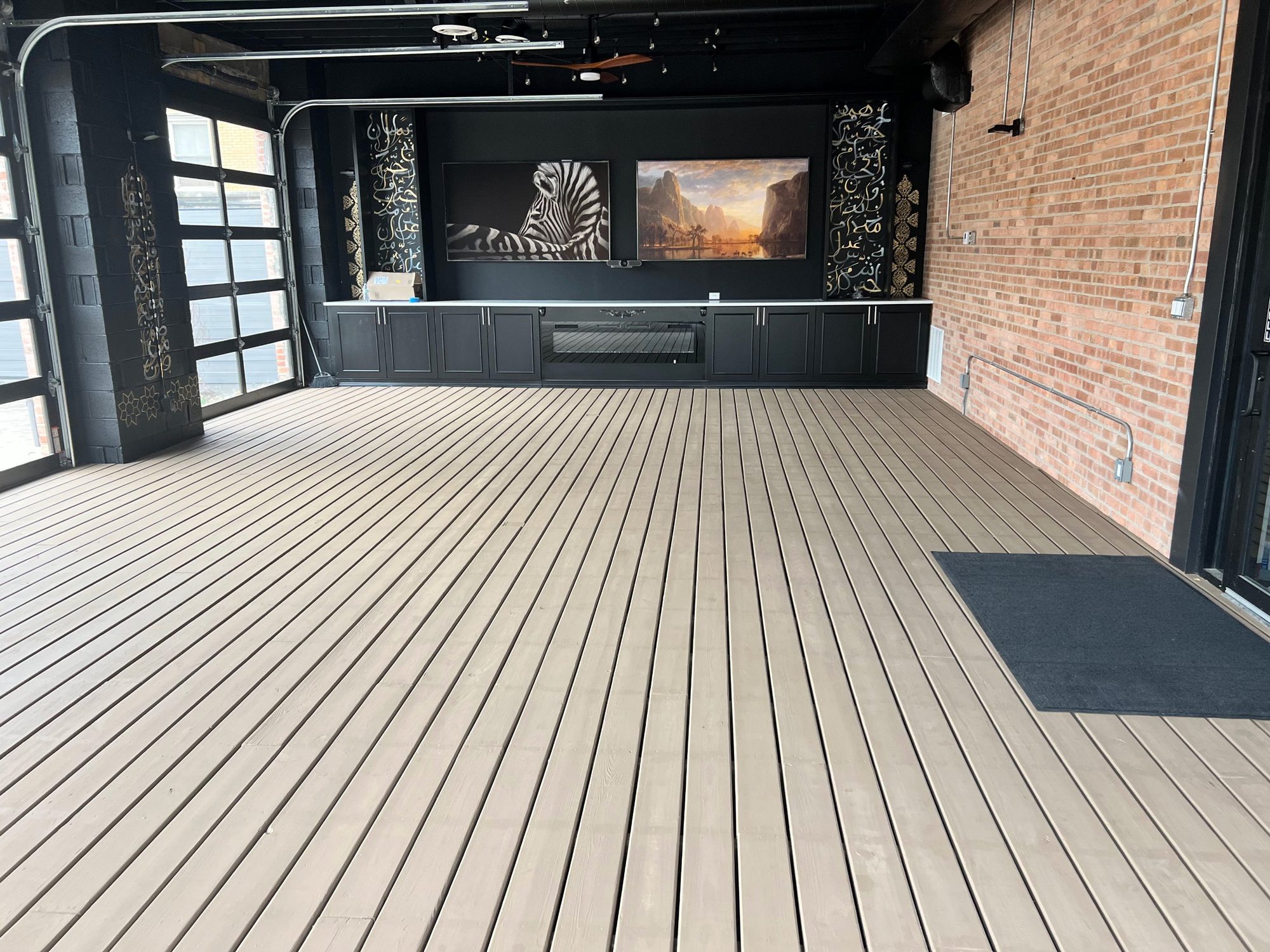 Finished lounge with media wall and seating