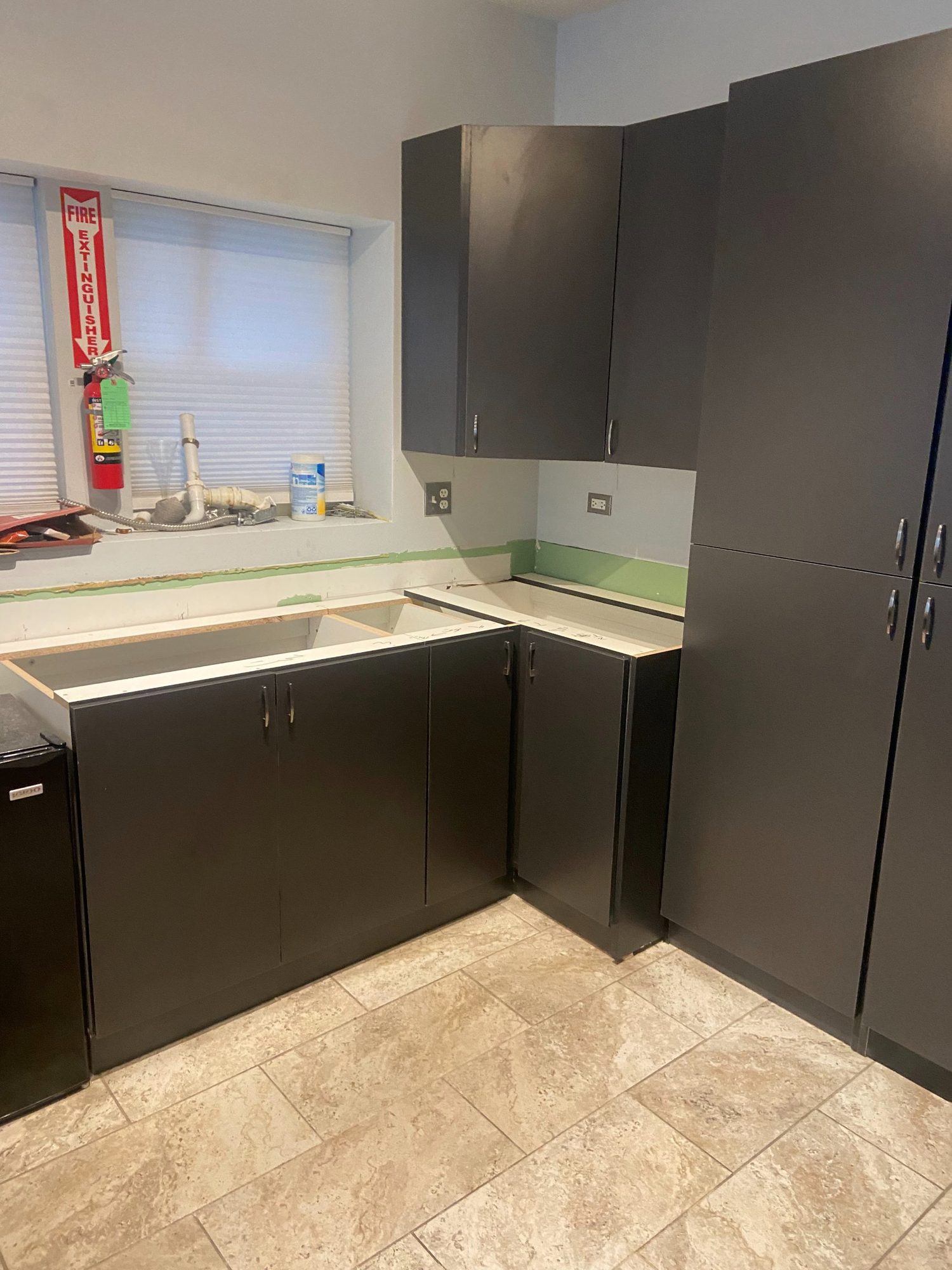 Kitchen base and wall cabinetry installed