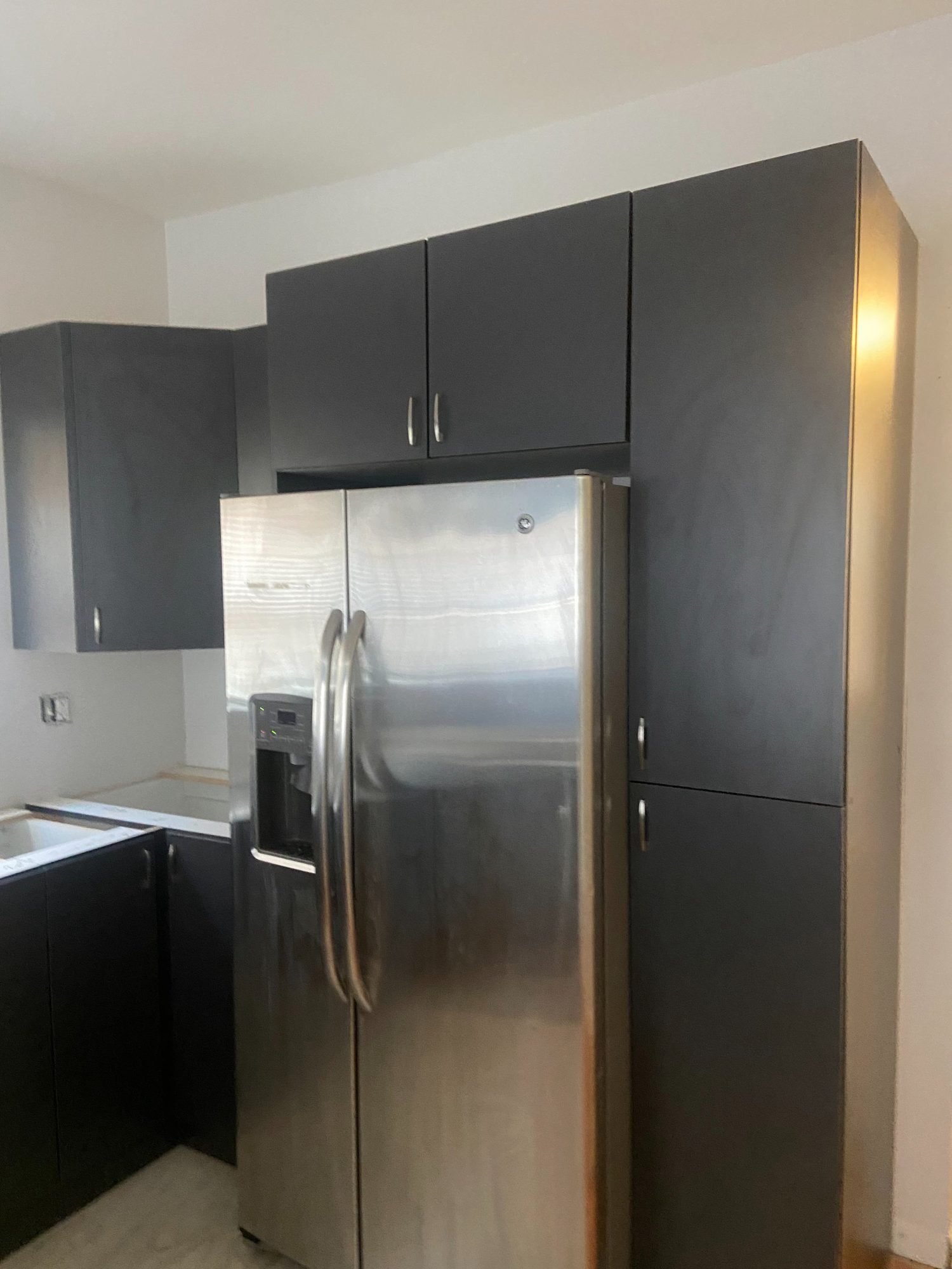 Built-in refrigerator surround cabinetry